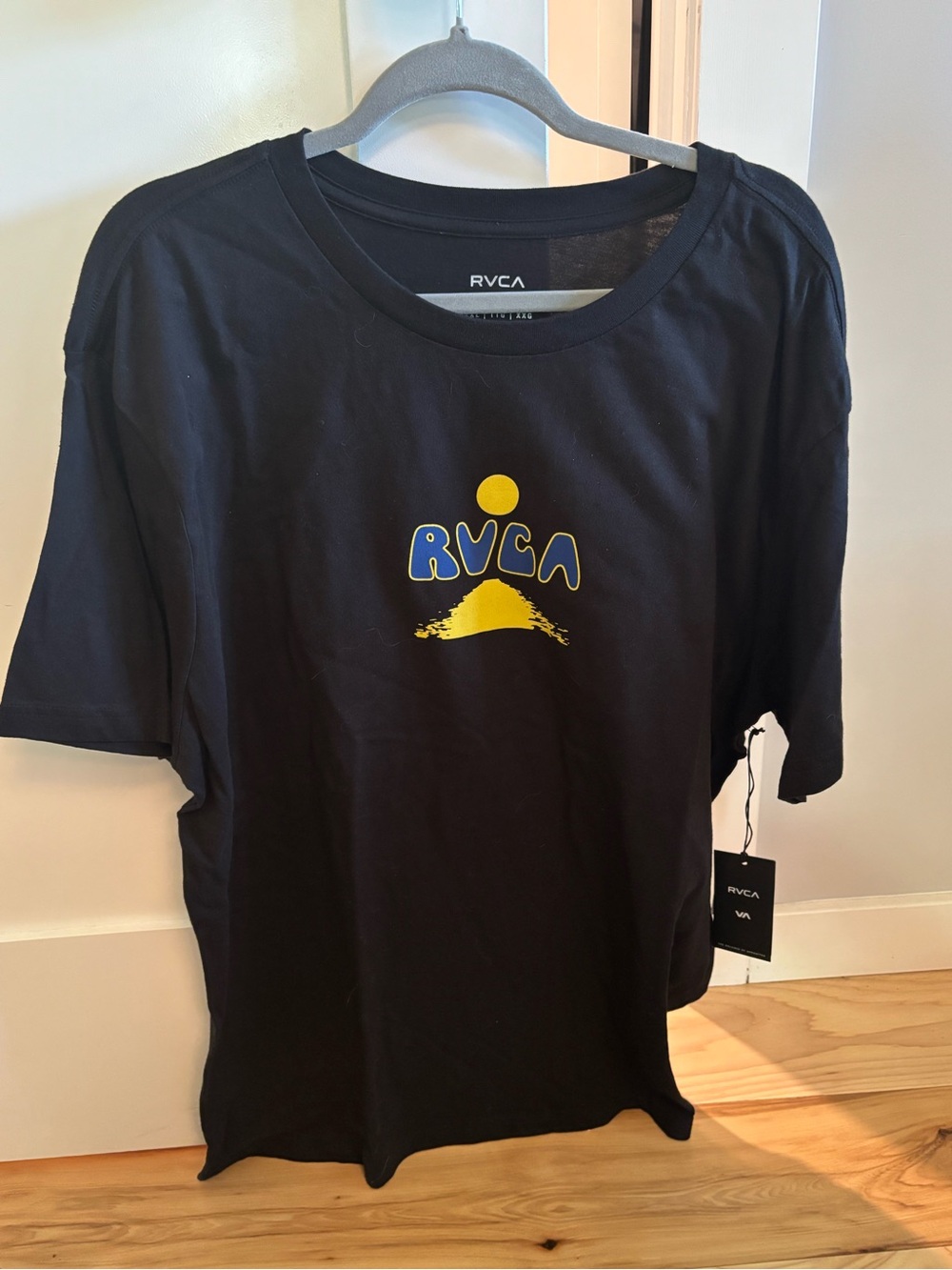 RVCA Black Short Sleeve Tee with Yellow and Blue Logo
